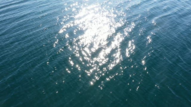 Sea water sparkling with reflected sunlight