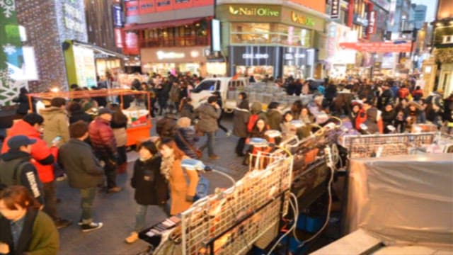 Bustling Alley Street Scene at Dusk
