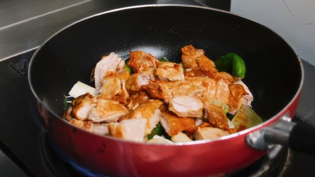 Sizzling Chicken Stir Fry witn Pan on Stove