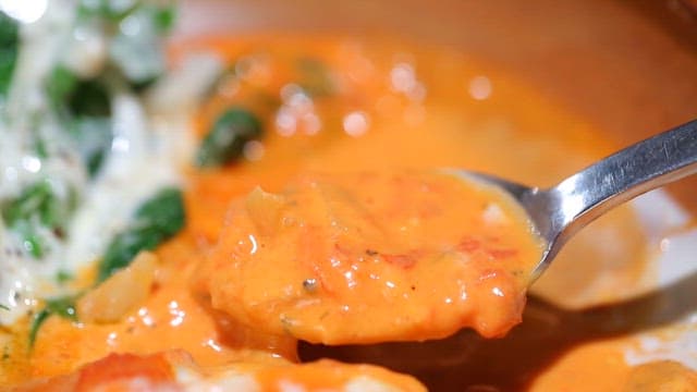 Spoonful of creamy rose cream soup