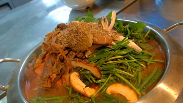 Hot pot dish with fresh vegetables and mushrooms