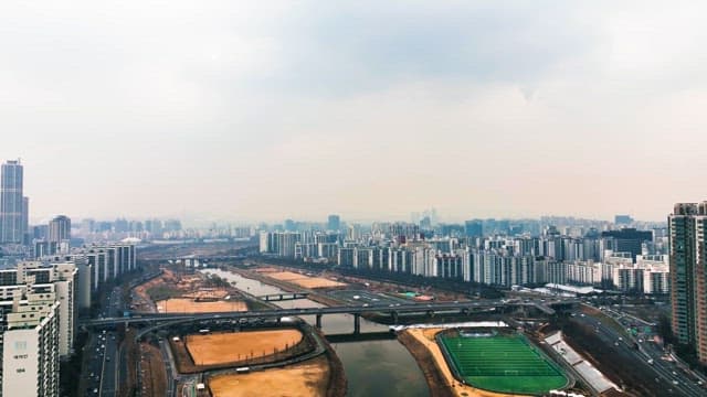 Waterside Parks Contrast with the Busy and Dense City