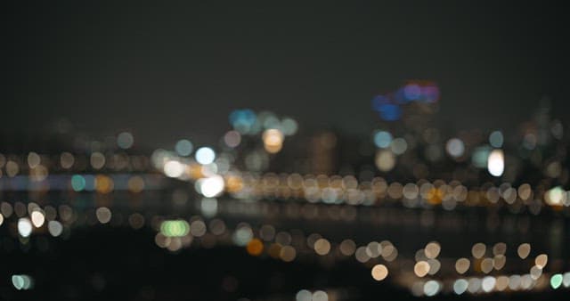 City nightscape with blinking buildings and Han river