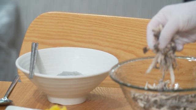 Oyster mushrooms prepared in a bowl with noodles