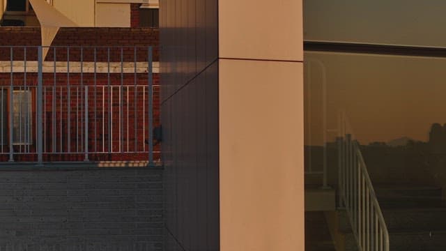 Sunset reflecting on a building facade