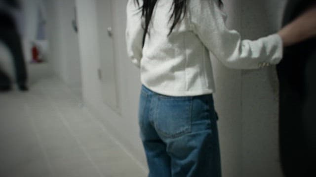 Woman Entering the House After Opening the Front Door Lock