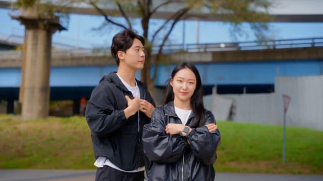 Couple standing outdoors in casual wear
