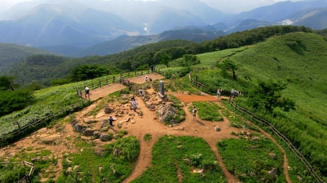Scenic mountain view with hikers