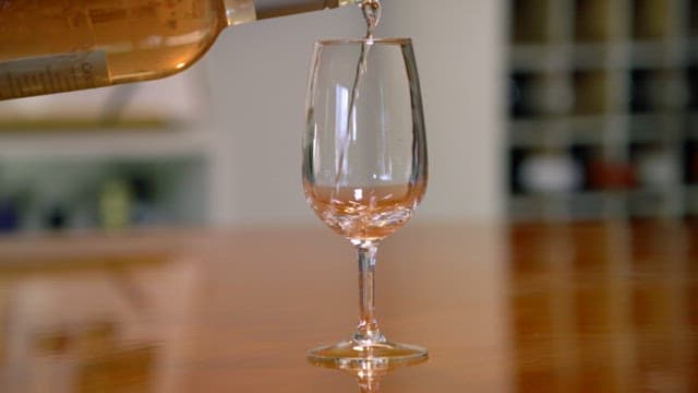 Pink Colored Sparkling Drink Filled in a Glass