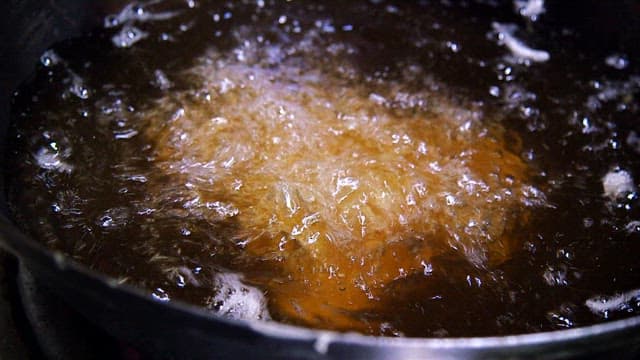 Deep frying food in hot oil
