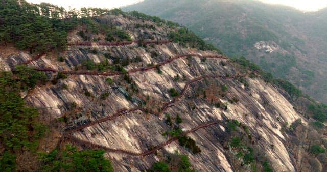 Winding Walking Path Surrounded by Steep Cliffs