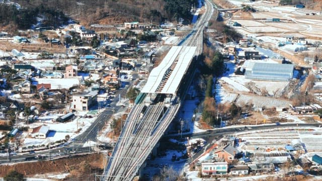 Aerial View of a Train Station in Winter