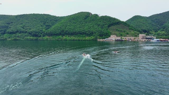 Boat passing over a tranquil river