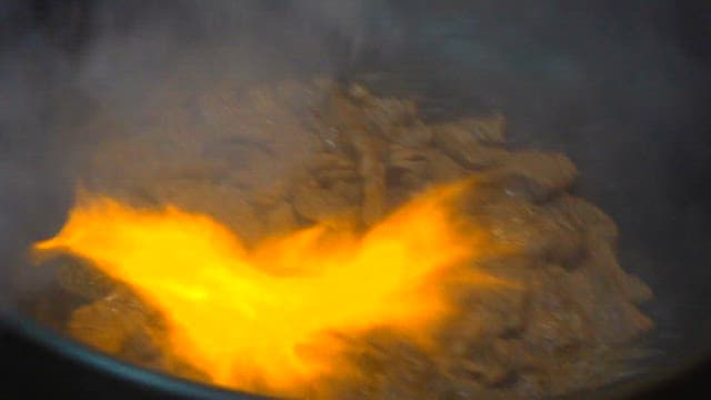 Beef grilled with gas fire and torch