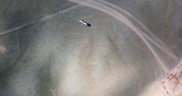 Lonely truck in the middle of the desert