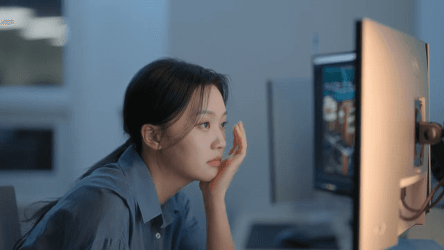 Woman working late at the office