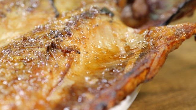 Crispy, golden-brown grilled spanish mackerel